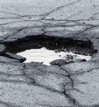 Photograph of pothole in png