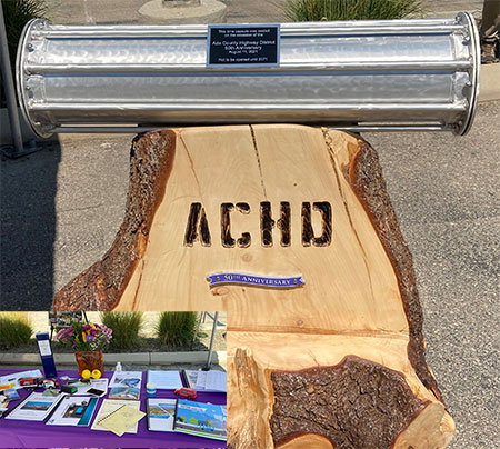 Photograph of Time Capsule with items inset