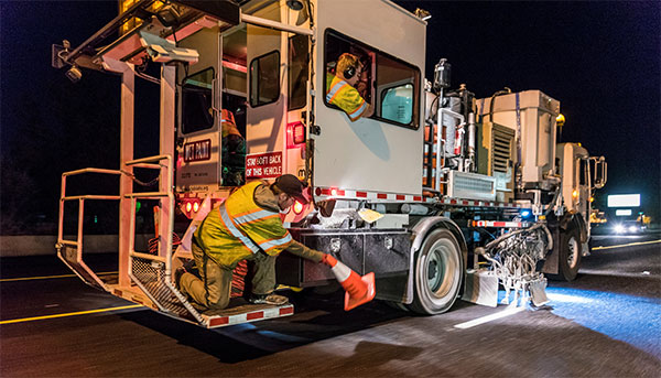 Photograph of paint truck in motion