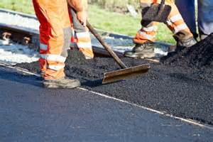 Photograph of applying asphalt